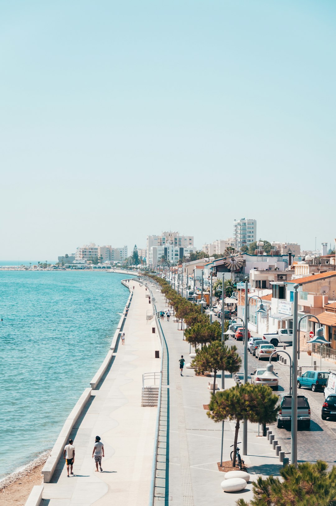 About city-buildings-near-body-of-water-during-daytime-qtsjdhepgs8